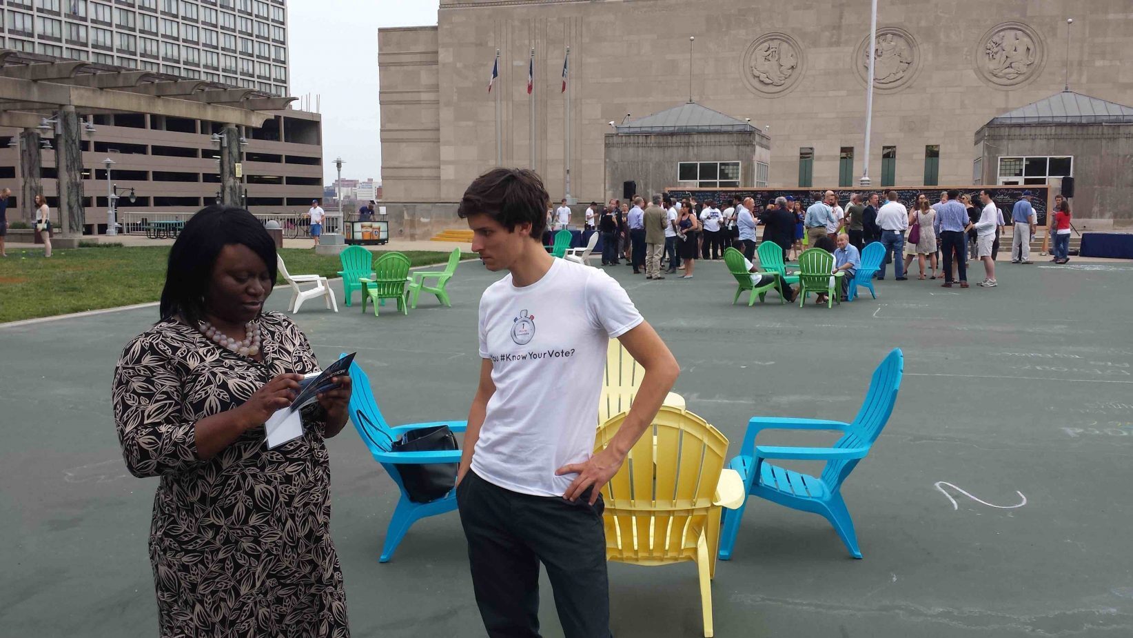 Caleb Loya talking to Alissia Canady, KCMO 5th district city council.