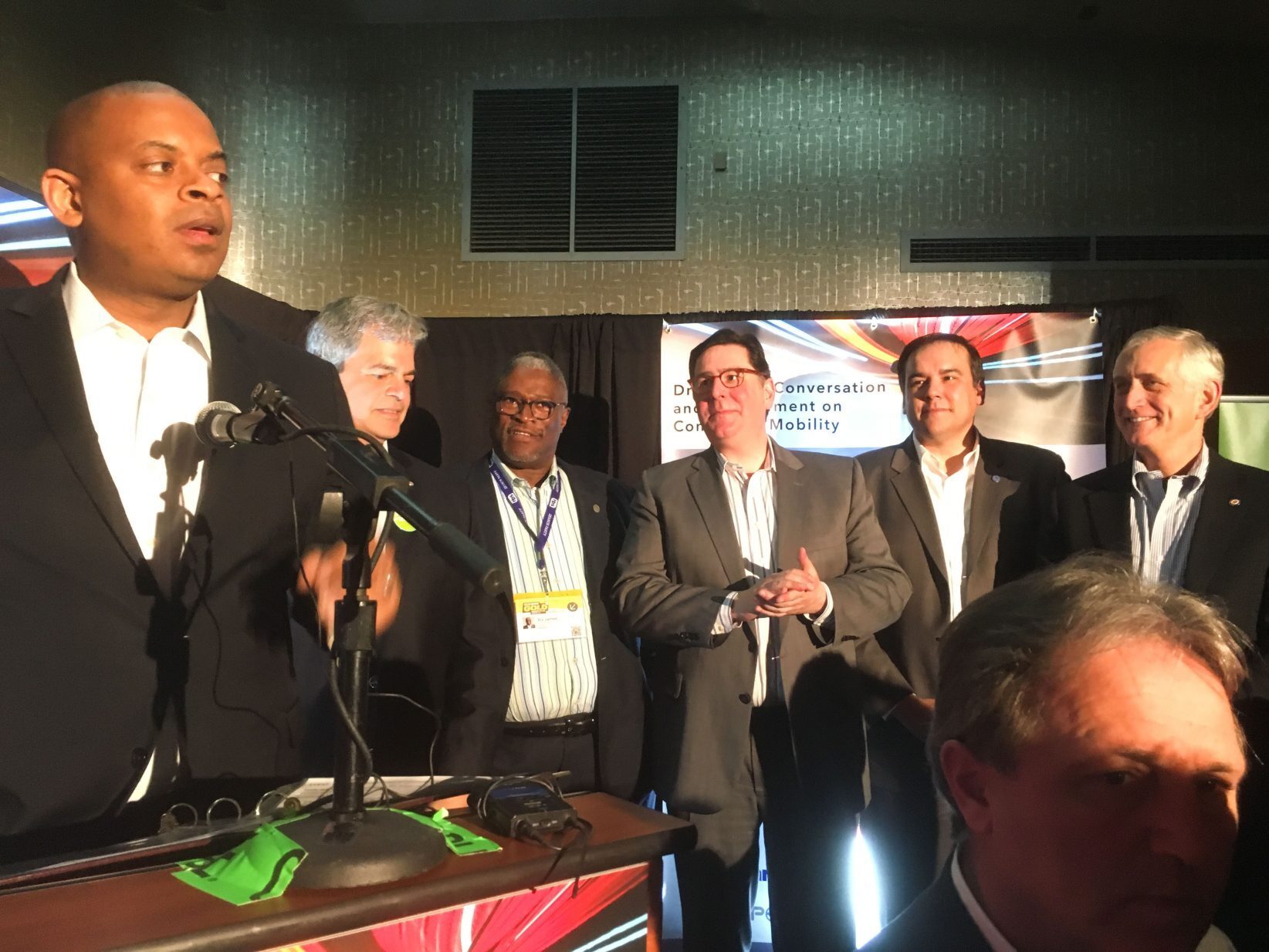 U.S. Secretary of Transportation Anthony Foxx, left, welcomes the mayors of several cities named as finalists for the “Beyond Traffic, Smart City Challenge.”