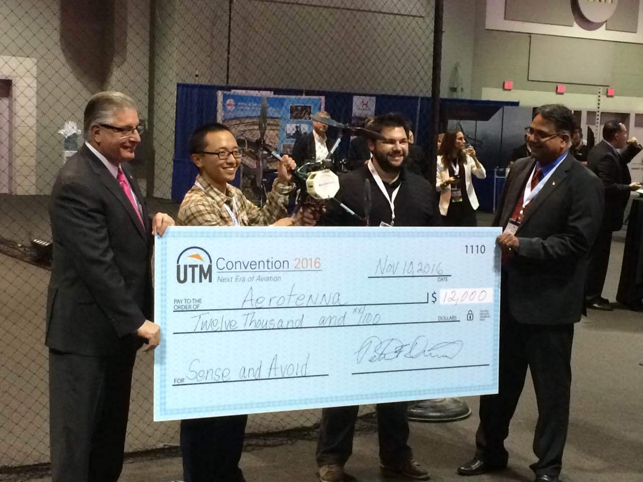 The Aerotenna team accepts its award.