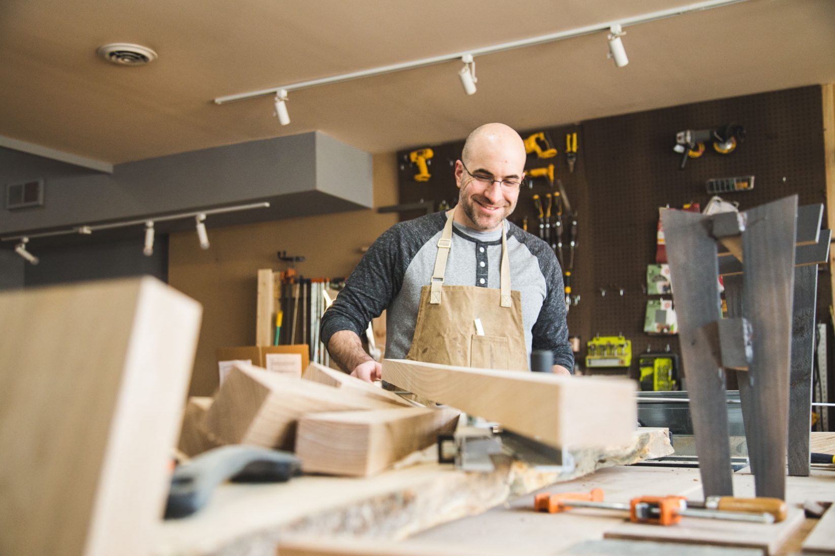 Madison Flitch founder John Pryor works at his Crossroads Shop. Photo by Bobby Burch
