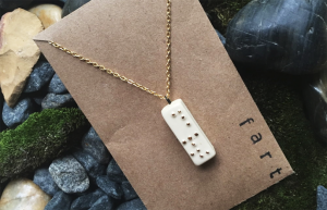Fart necklace by NEAT! artist studio, KC Apparel