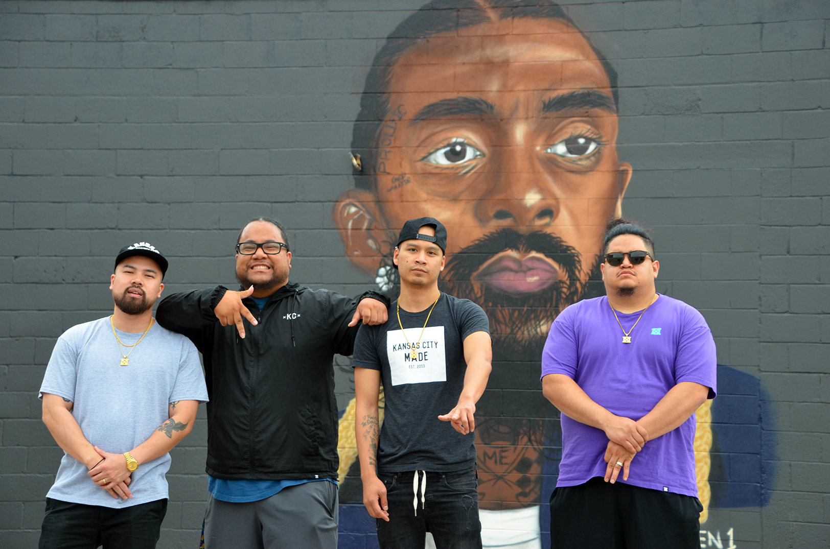 Vu Radley, Mark Launiu, Jesse Phouangphet, and Max Ayalla, MADE MOBB/MADE Urban Apparel; mural by Jonathan Munden