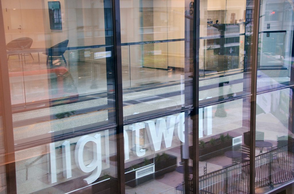 Lightwell building overlooking the outdoor seating of Jason's Deli, incoming home of Strang Chef Collective at Lightwell