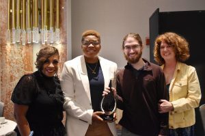 Jannae Gammage and Milad Ghasempour, The Market Base, center, with their mothers at the Greater Kansas City Chamber of Commerce Small Business Celebration