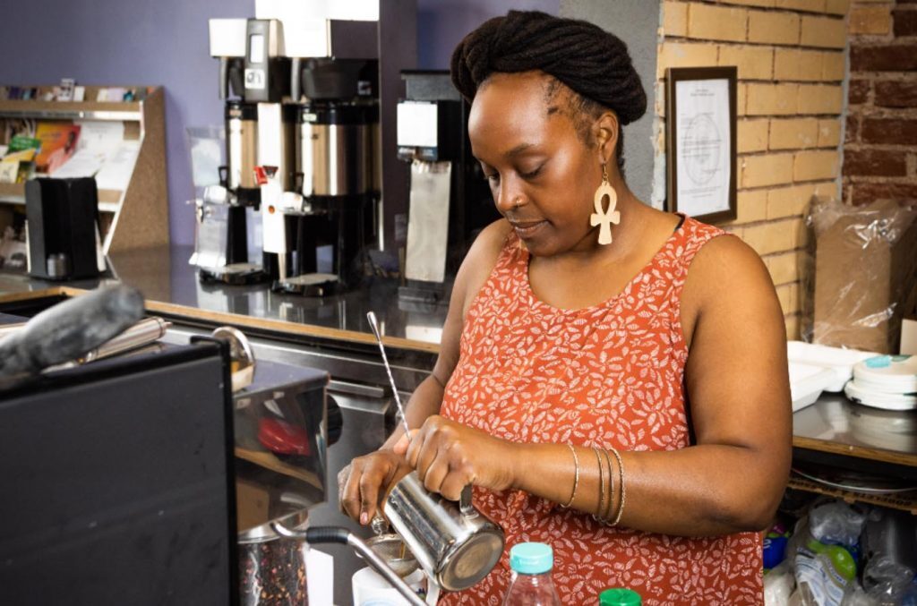 Nika Cotton makes a drink at Soulcentricitea, which she opened on Troost Ave. last July. Cotton applied for a grant from the Restaurant Revitalization Fund, but did not receive any money. Photo by Zach Bauman/The Beacon