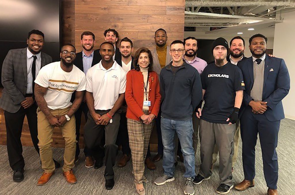 Fall 2019 Elevation Lab Tech Venture cohort with Sally Williams; front row, Jerren Thornhill, Kwinton Scarbrough, Sally Williams, Aaron Monson, Jeremy Williams, and Juaquan Herron; back row, Rodney McDuffie, Zach Davis, James Bailey, David Biga, Jordan Williams, Hassan Ali, and former SBDC counselor Ryan Comeau