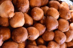 Restaurant Week 07 Puffs from Fannies African & Tropical Cuisine, and Margaret Bai, Bai The Way Hair Salon, at a Kansas City Restaurant Week preview event at J. Rieger's Monogram Lounge