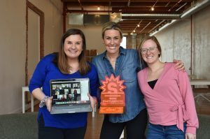 Cara Hennessy, Sarah-Allen Preston, and Morgan Miller, afloat