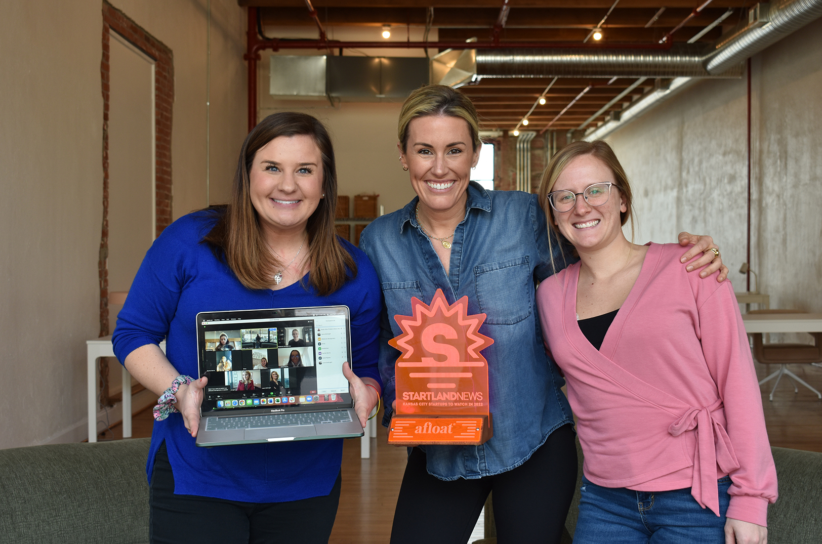 Cara Hennessy, Sarah-Allen Preston, and Morgan Miller, afloat