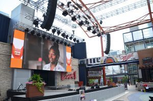 CBTW22 event 09 Tammy Buckner, WeCode KC, hits the screen and stage at the 2022 Community Builders to Watch celebration