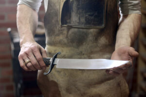 Brandon Dearing Hand and Hammer 05