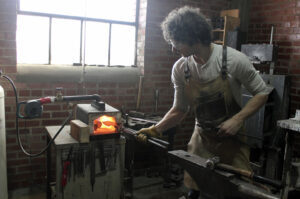 Brandon Dearing Hand and Hammer 09