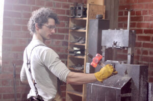 Brandon Dearing Hand and Hammer 12