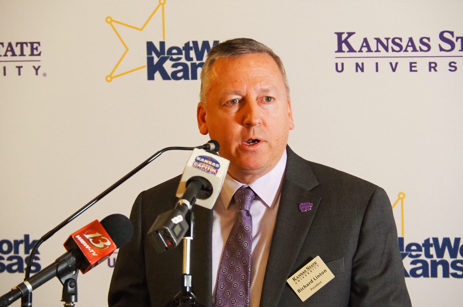 Richard Linton, president of Kansas State University, announces details of the K-State 105 initiative at an event in Topeka; photo by Tim Carpenter, The Kansas Reflector