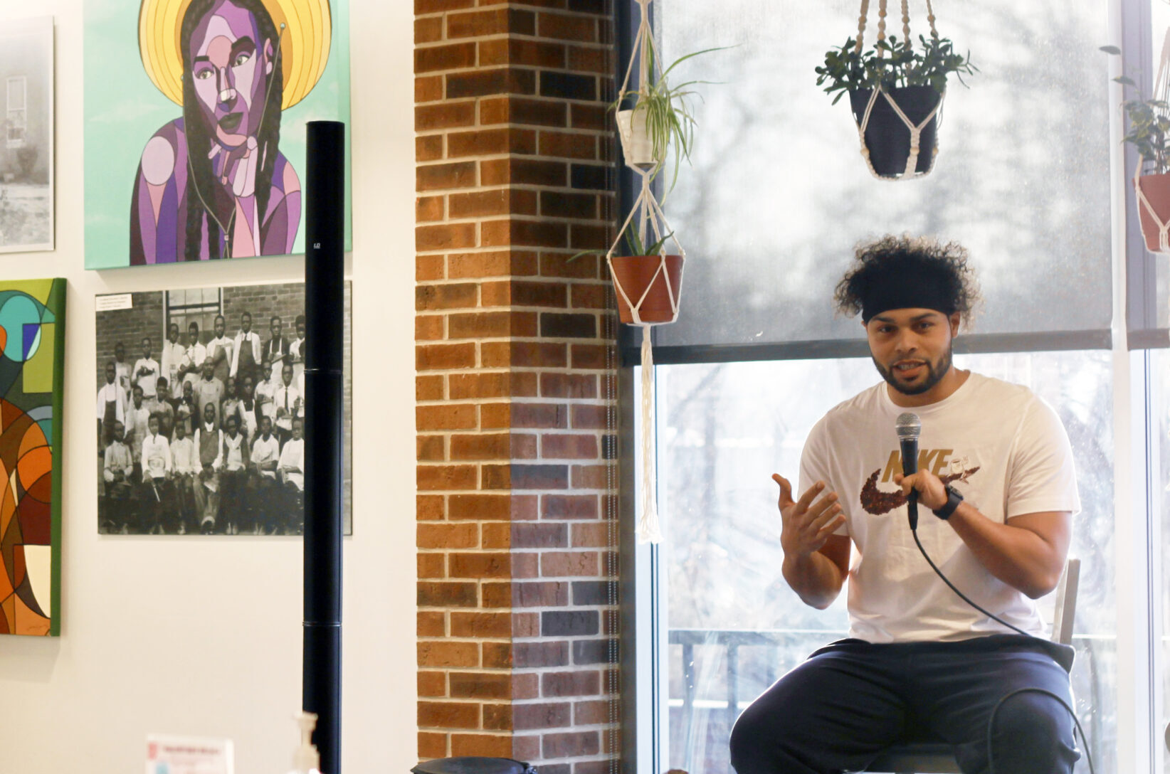 TJ Roberts, Kinship Cafe, speaks at BlendWell Community Cafe, during a Black History Month event