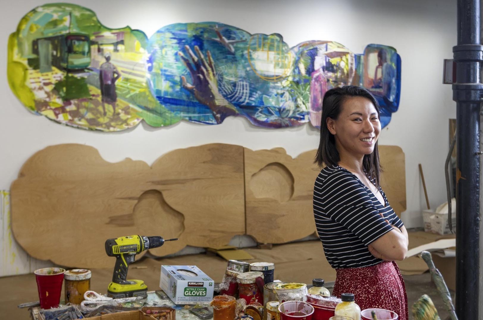Artist Kathy Liao inside her downtown studio; photo by Jim Barcus