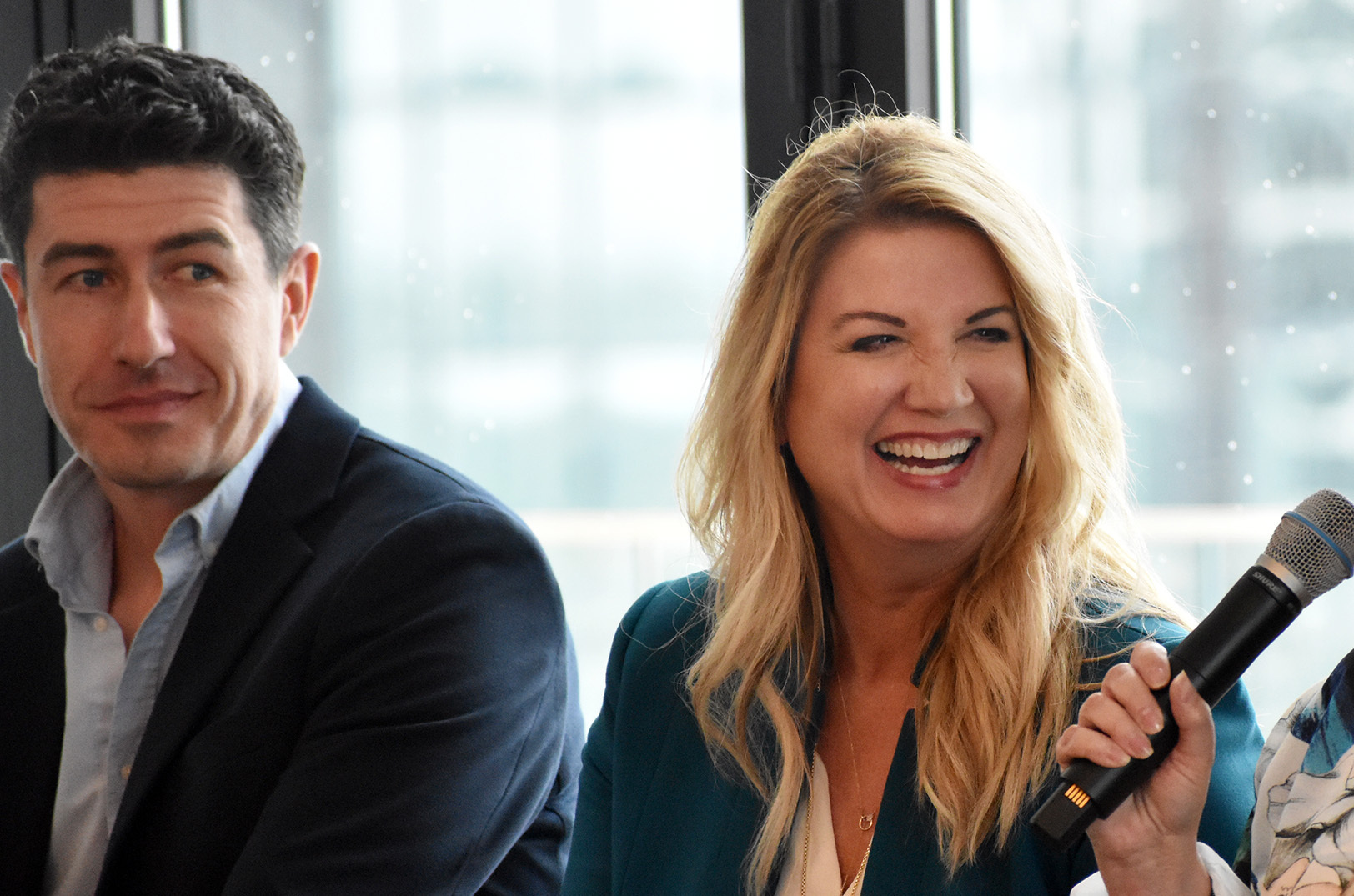 Melea McRae, Crux, right, laughs alongside George Brooks, Crema, during a panel conversation at the KC Chamber's 2023 Small Business Top 10 Reception; photo by Austin Barnes, Startland News