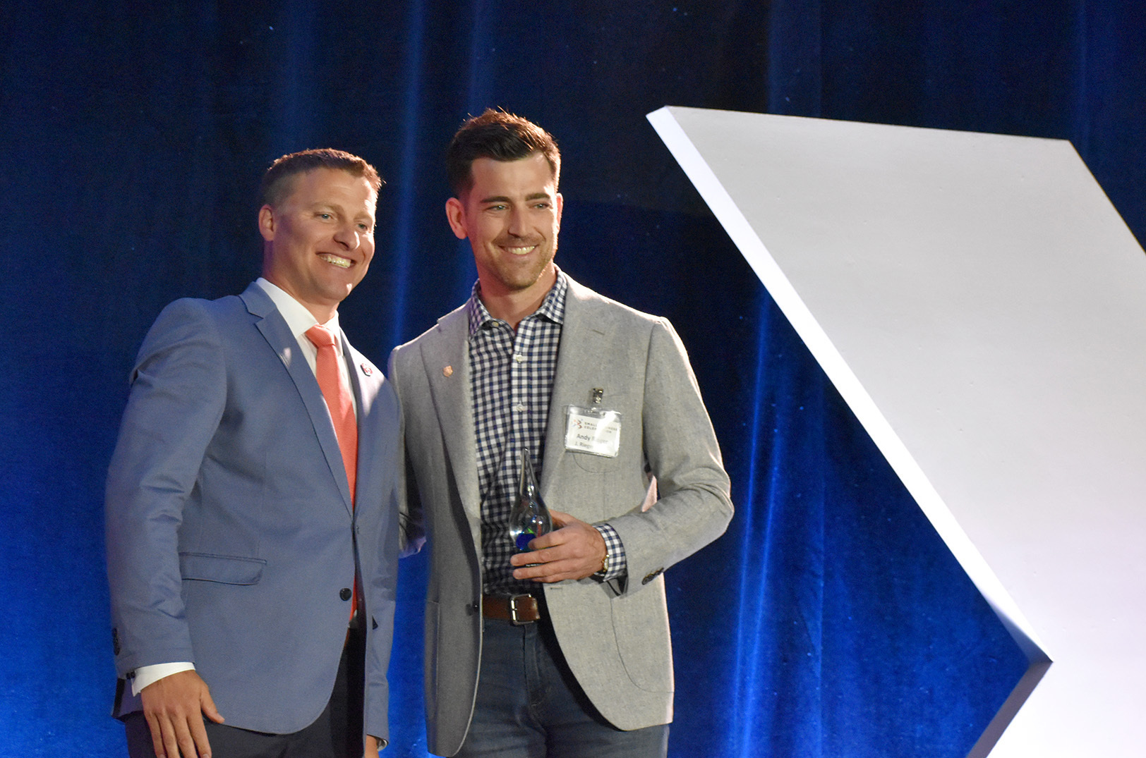 Andy Rieger, J. Rieger, right, receives the 2023 Weida Award for International Small Business of the Year from Eric Wollerman, Honeywell Federal Manufacturing and Technology, , during the KC Chamber's Small Business Celebration; photo by Nikki Overfelt Chifalu, Startland News