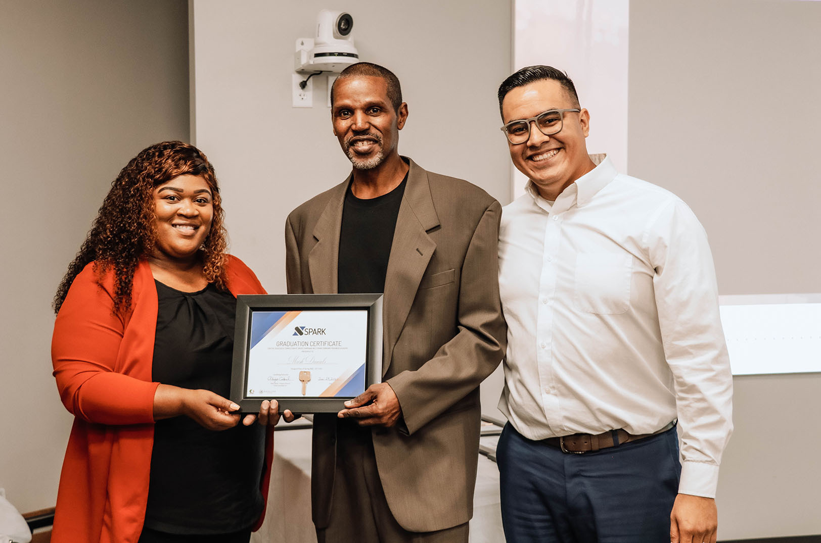 Ti’Juana Hardwell, Mamarazzi Communications, Mark Daniels, Wichita Cheesecake Company, and Alejo Cabral, Create Campaign, at a Create Campaign graduation event; photos courtesy of Create Campaign