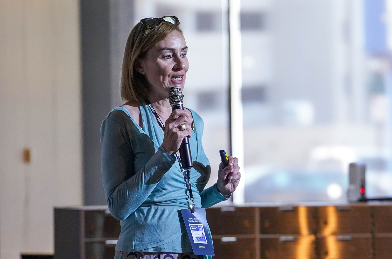 Anna Gannon, founder of New York-based Curbicus — a clean, compostable solution to dog waste — speaks during the June 15 Animal Health & Ag Tech Summit Expo; photo courtesy of Plug and Play Topeka