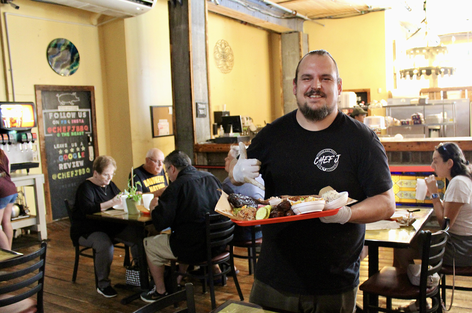 Justin Easterwood, better known as “Chef J,” at Chef J BBQ in Kansas City's West Bottoms; photo by Sidney Steele