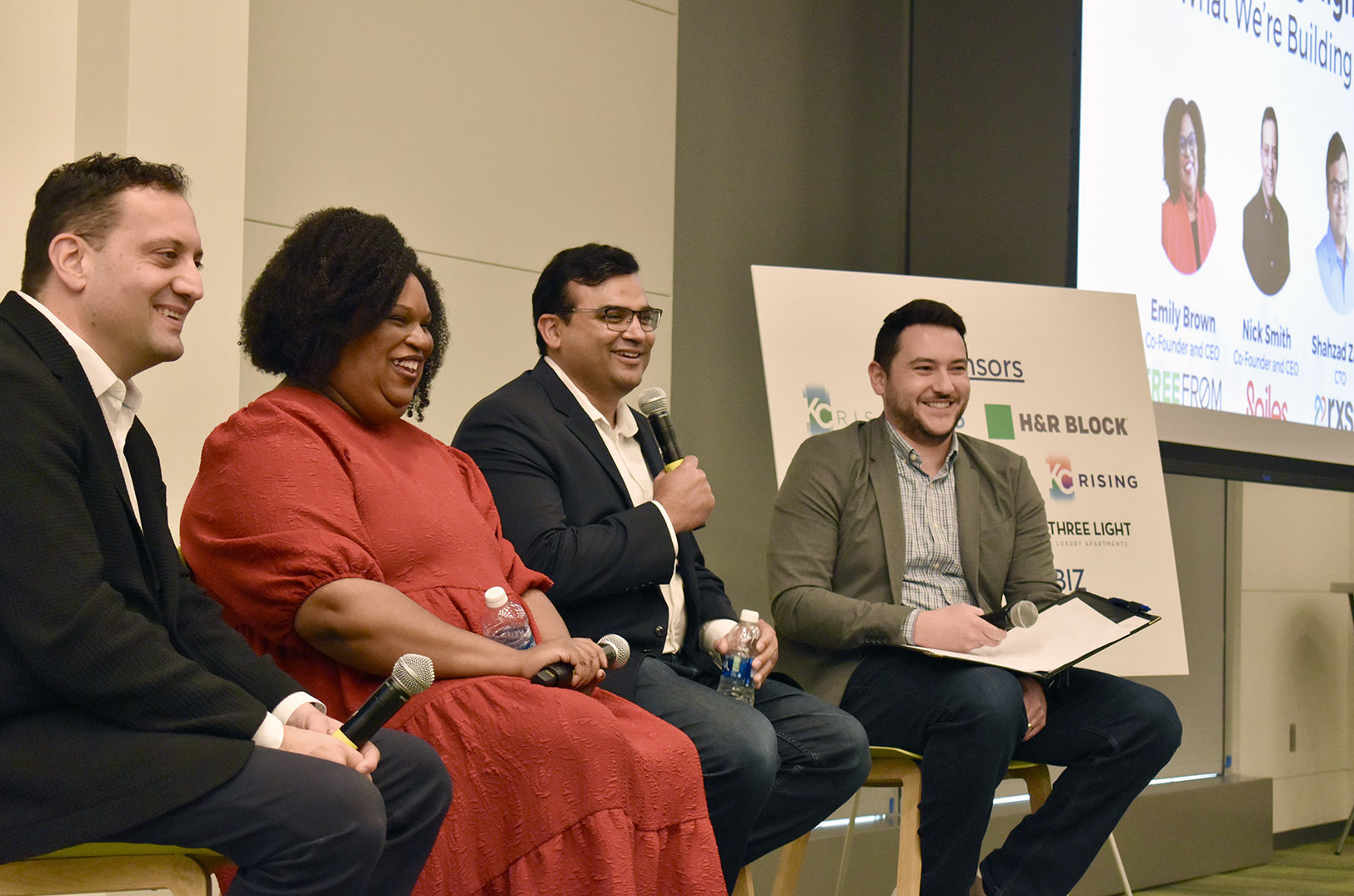 Nick Smith, Sailes; Emily Brown, Free From Market; Shahzad Zafar, Rx Savings Solutions; and Bryce Navarro, Husch Blackwell; share a laugh Sept. 22 at H&R Block during Back2KC; photo by Nikki Overfelt Chifalu, Startland News