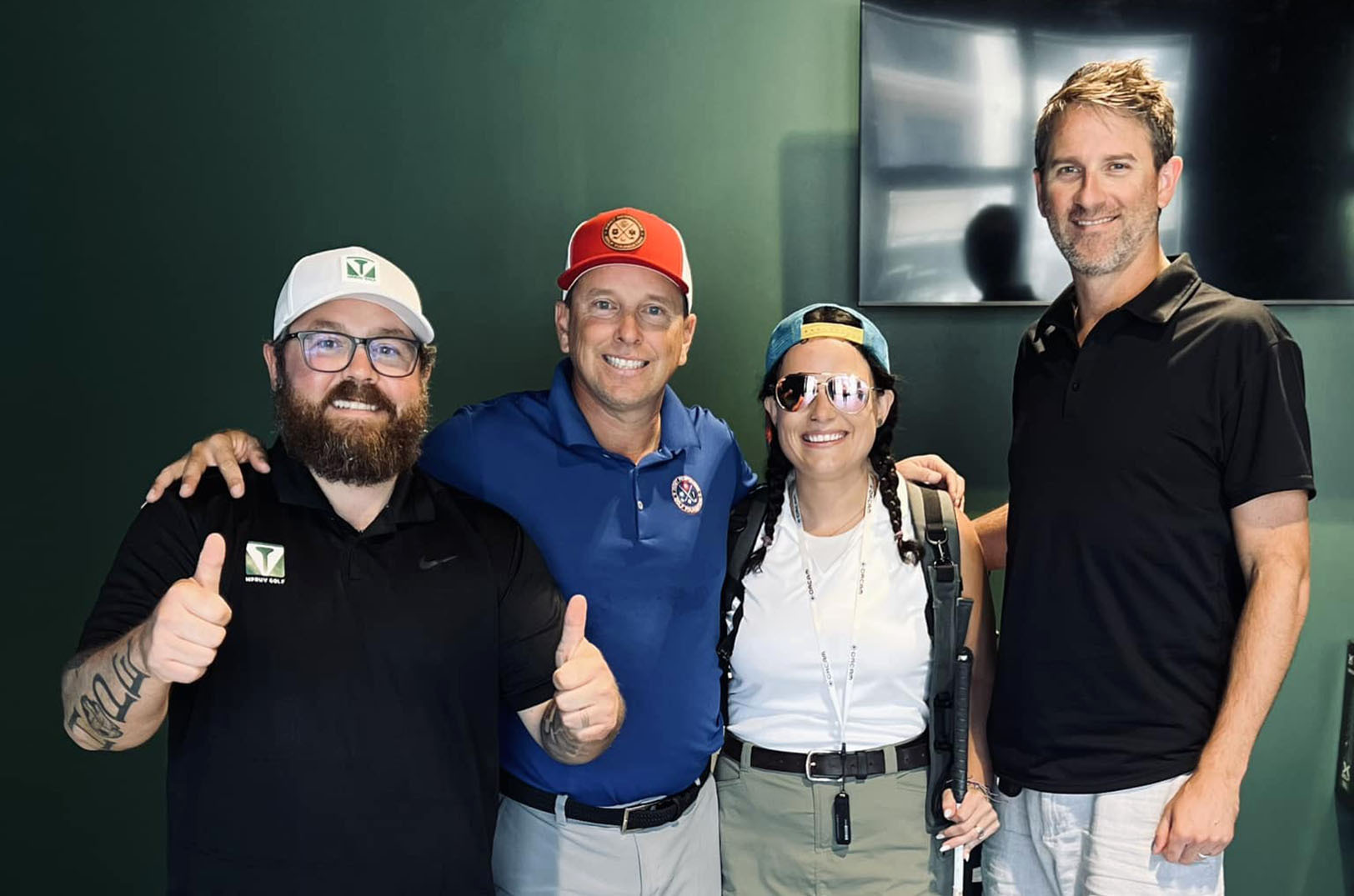 Mark Lukenbill, Mpruv Sports, Steve Pope, First Responder Golf Foundation, Ashley Mizell, and Matt Doud, Mpruv Sports, are pictured at X-Golf Parkville, a partner of Mpruv Sports, during a session with Mizell, who is visually impaired. The session was part of Mpruv Sports’ inclusion and accessibility initiatives; photo courtesy of Mpruv Sports