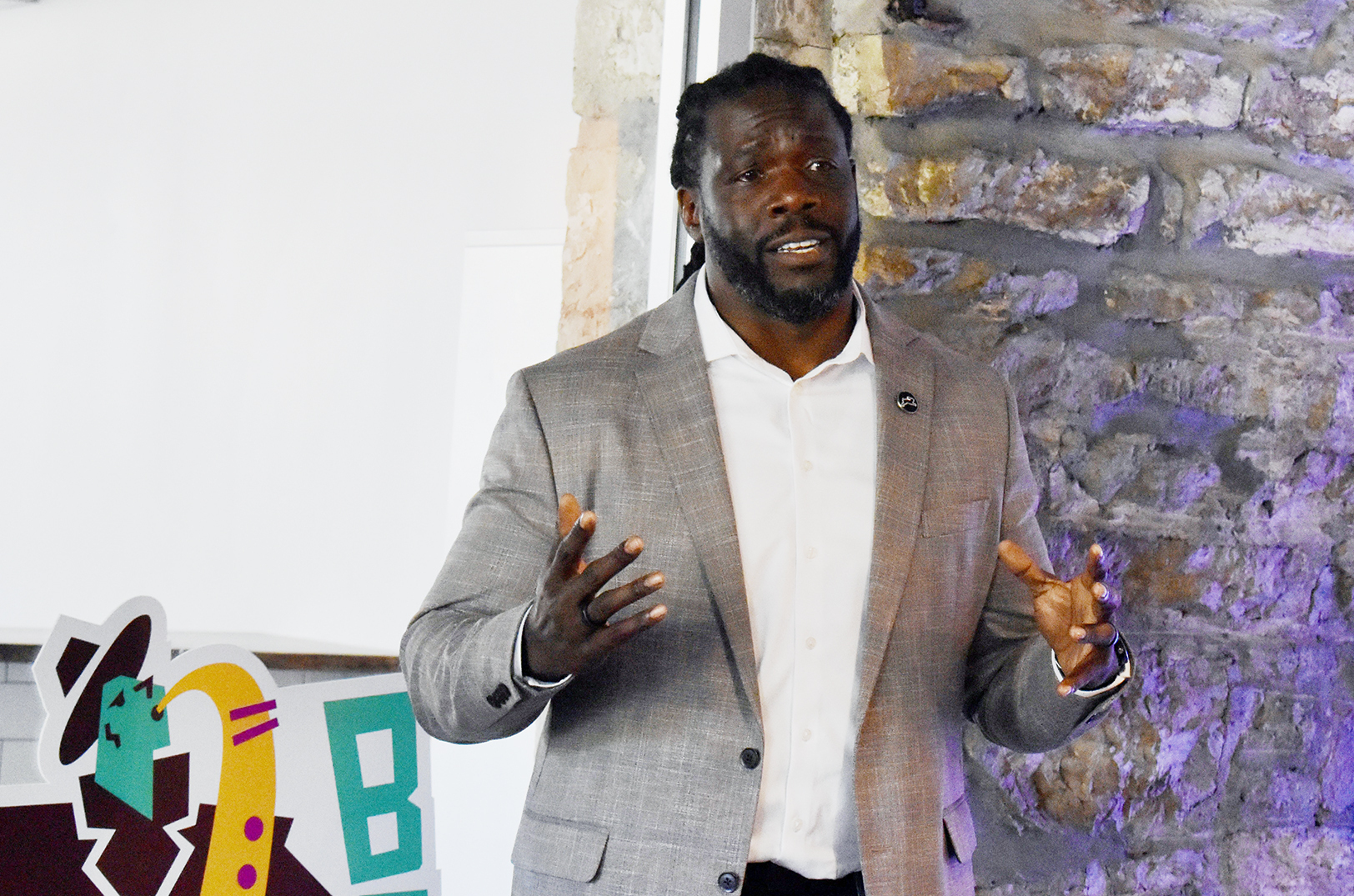 Marcus Whitney, Jumpstart Health Investors, speaks at Vine Street Brewing during BioNexus KC’s luncheon on investing in Black and Brown innovators; photo by Nikki Overfelt Chifalu