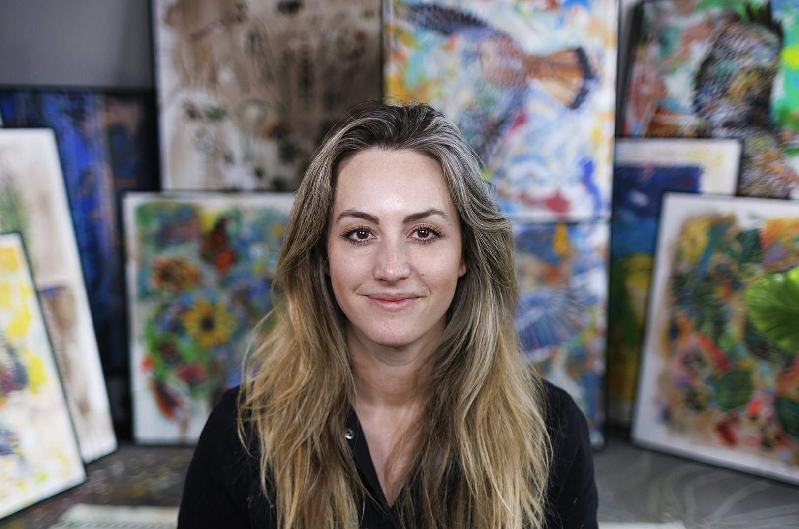 Megh Knappenberger with the full "Origin Stories" collection; photos courtesy of Jack McClain