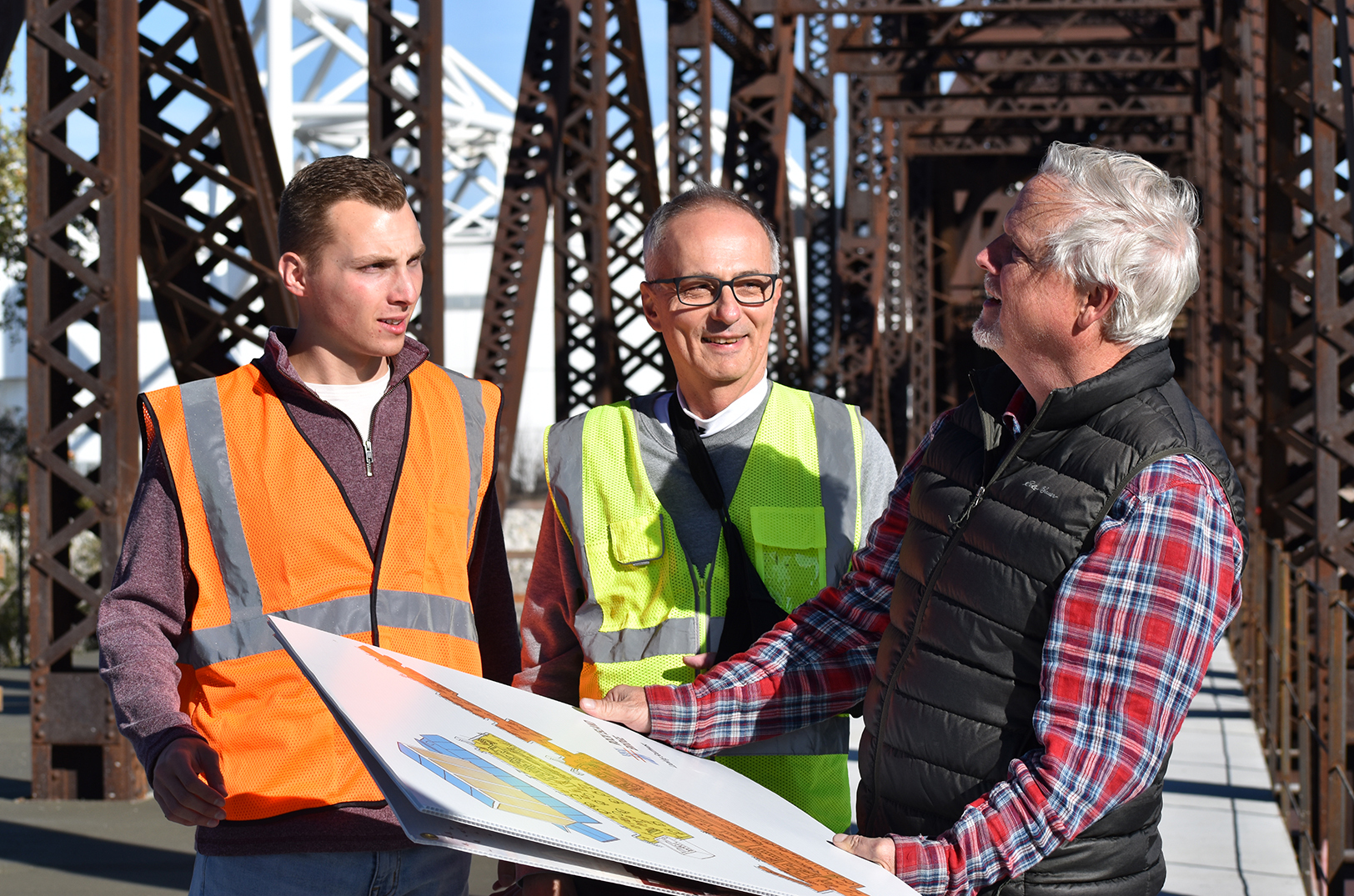 Jake Fesi, Mike Laddin, and Mike Zeller, Flying Truss, at the Rock Island Bridge, November 2023; photo by Taylor Wilmore, Startland News