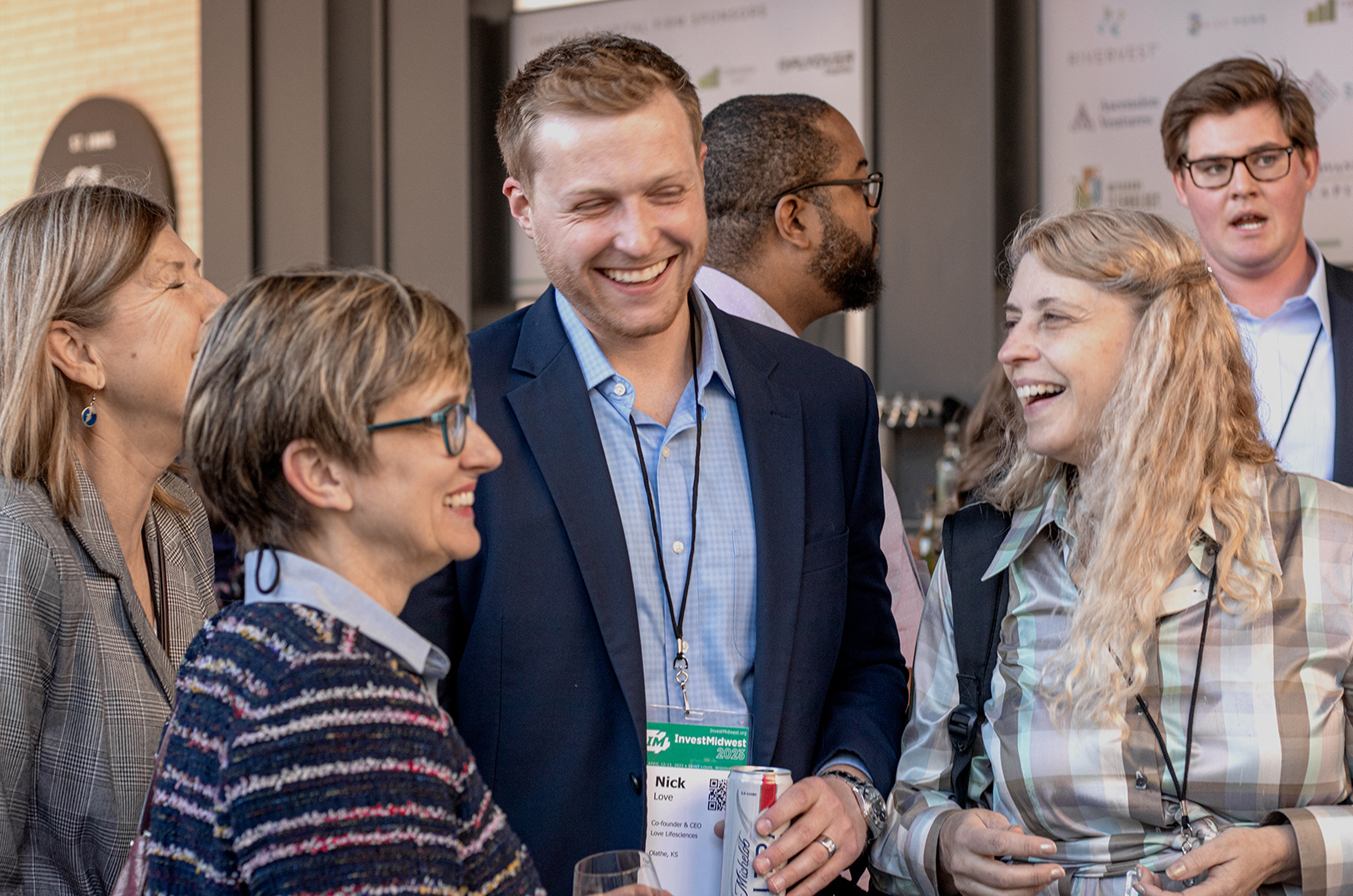 Nick Love, CEO and co-founder of Love Lifesciences, center, talks with fellow InvestMidwest attendees at the spring 2023 conference in St. Louis; photo courtesy of InvestMidwest