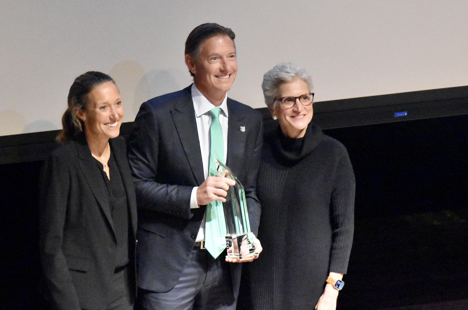 Angie and Chris Long, co-owners of the Kansas City Current, CPKC Stadium and Palmer Square Capital Management, are presented with UMKC’s Kansas City Entrepreneur of the Year Award; photo by Nikki Overfelt Chifalu, Startland News