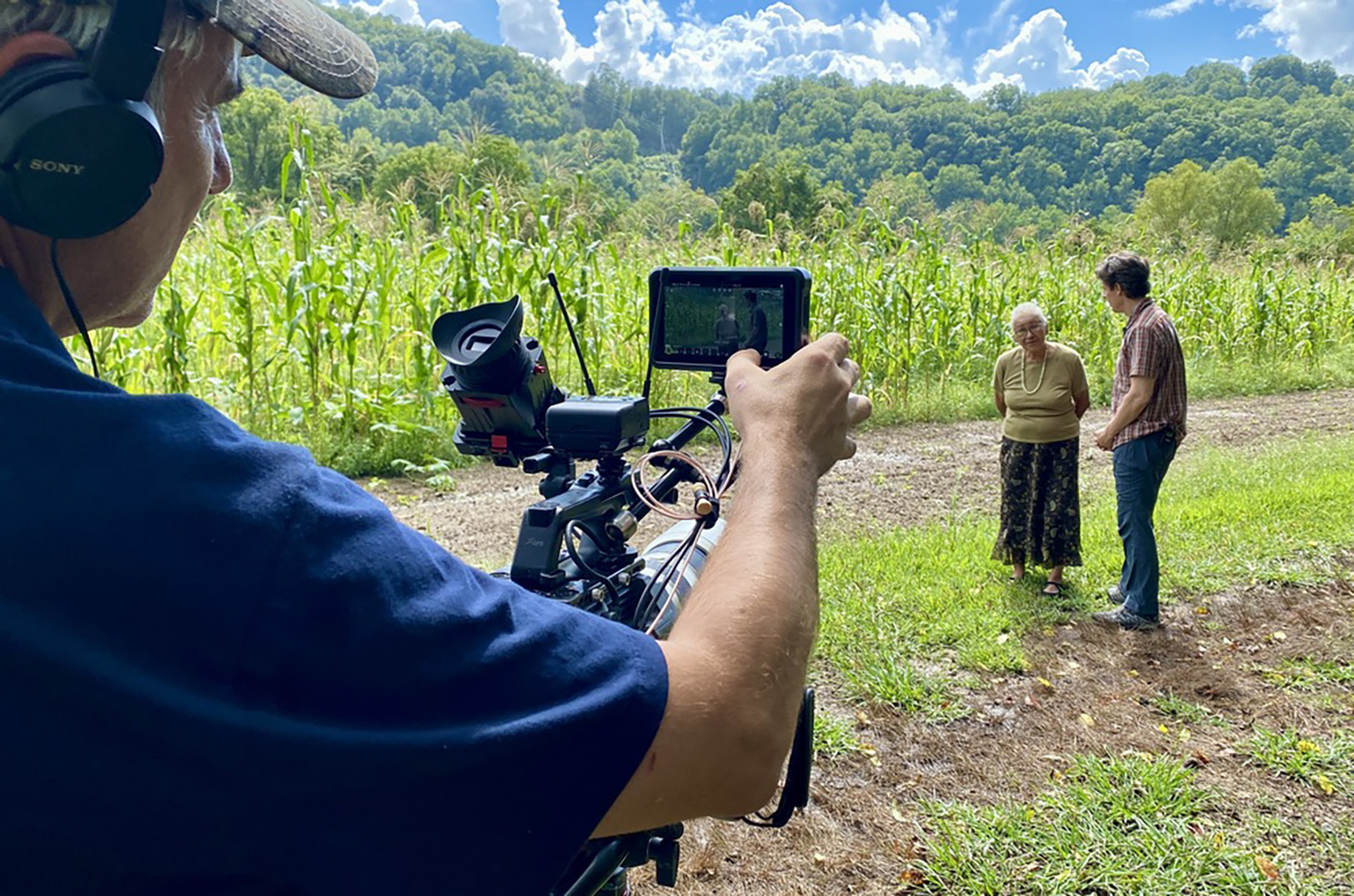 Jim Kane, right, films with Amy Walker "The Spirit Gardener" for an episode of "The Food Principle" on PBS; image courtesy of Jim Kane
