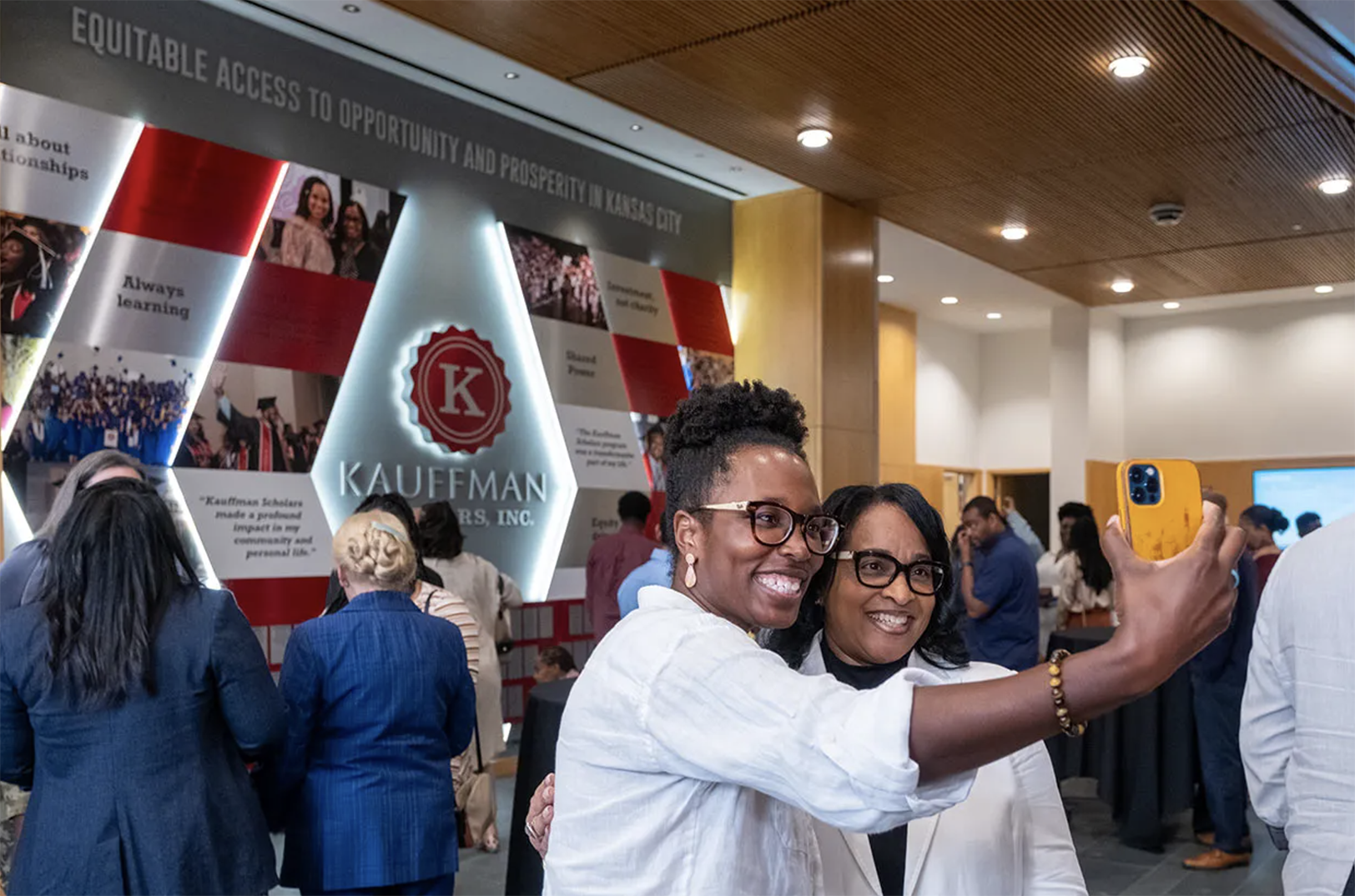 Kauffman Scholars alumni and supporters gather at the KSI Legacy Wall during a Sept. 21 ribbon-cutting event; photo courtesy of the Ewing Marion Kauffman Foundation