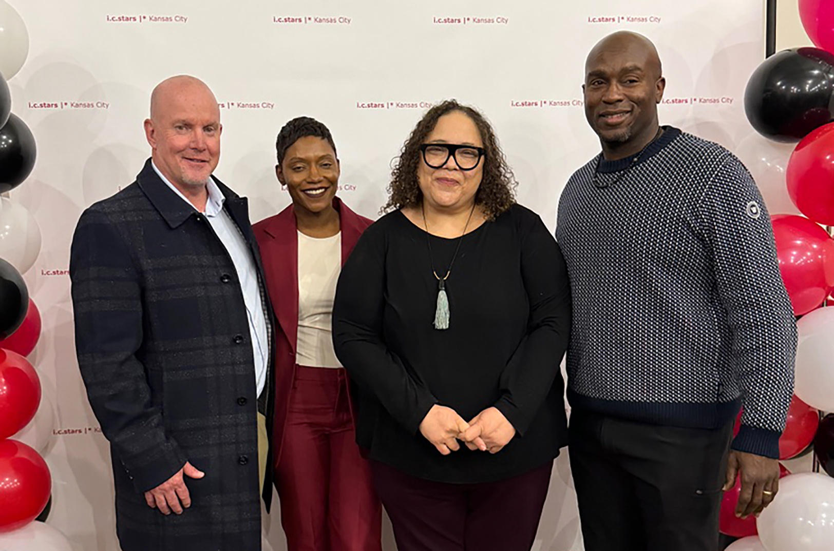 Matt Sharples, managing partner of TriCom technology services; Shamika Hogan, i.c.stars Kansas City executive director, i.c.stars co-founder Sandee Kastrul; and Will Shields, i.c.stars Kansas City advisory board chair; photo courtesy of i.c.stars