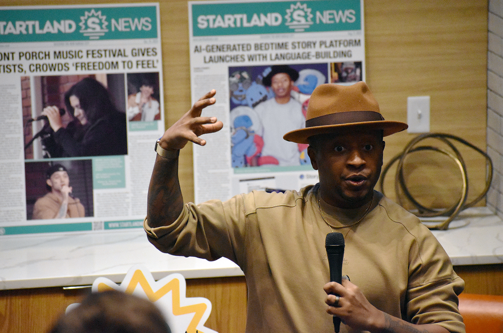 JQ Sirls, Storytailor, addresses the crowd for Startland News' SLN Live session in December 2023; photo by Tommy Felts, Startland News
