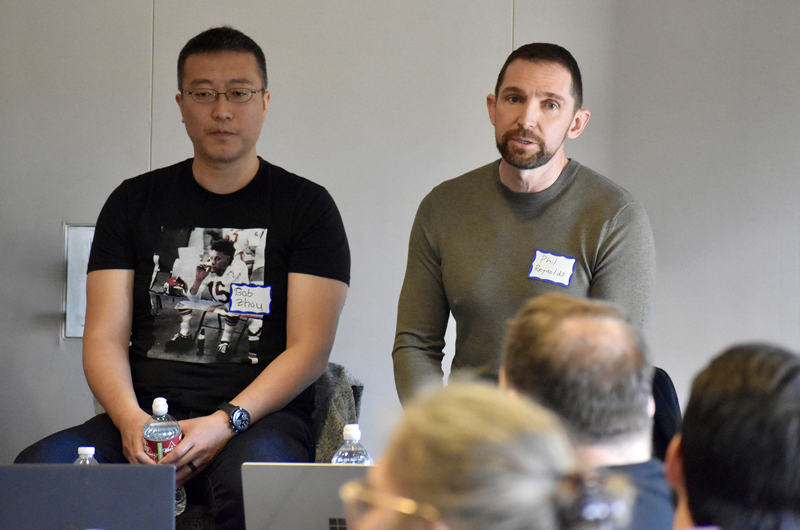 Phil Reynolds, DevStride, right, speaks alongside angel investor Robert Zhou during a UMKC Technology Venture Studio Sound Byte panel on preparing for mergers and acquisitions at Husch Blackwell; photo by Nikki Overfelt Chifalu, Startland News