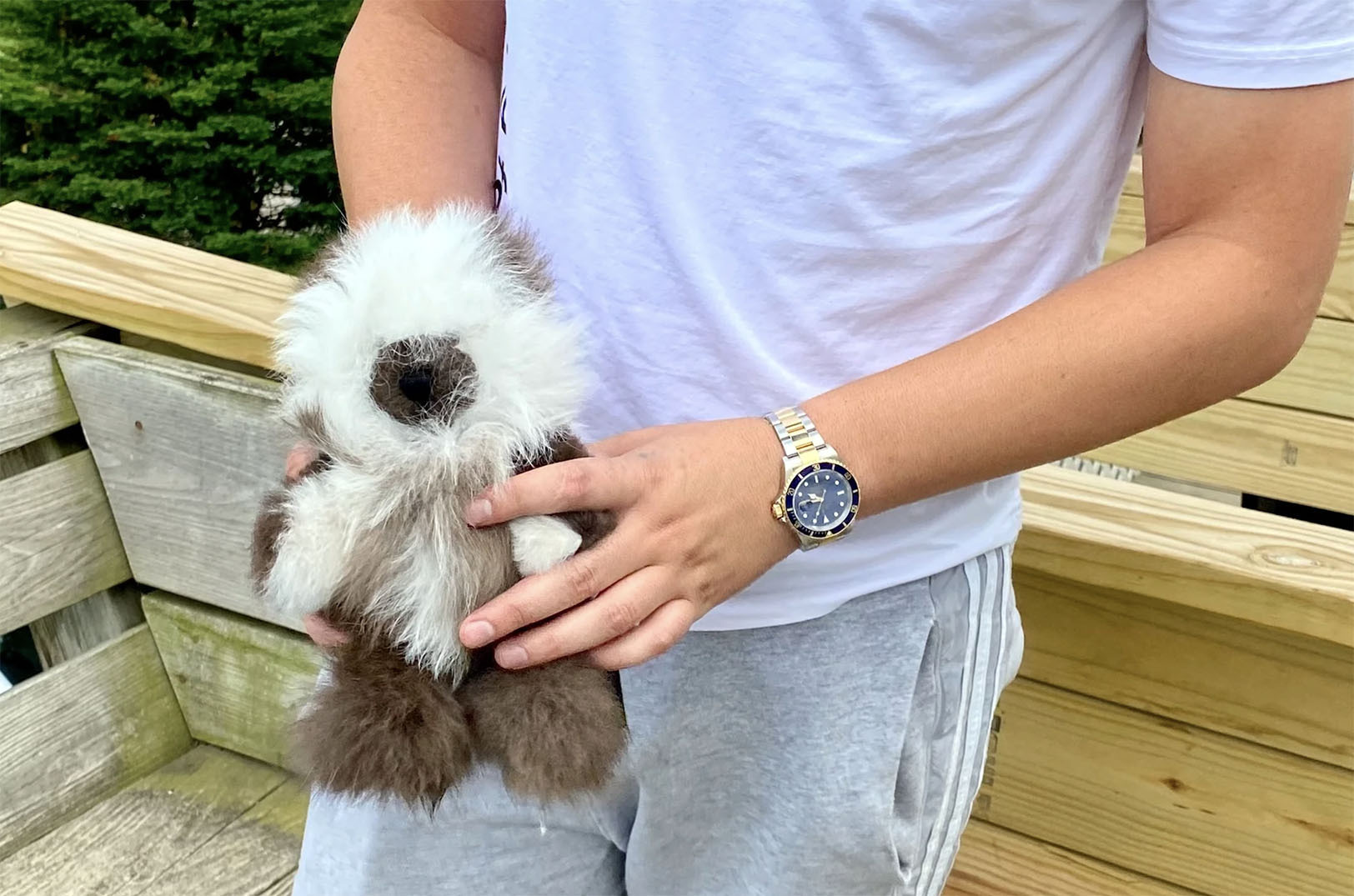 Stephen Castaneda holds a plush stuffed animal from GG’s Alpaca Farm