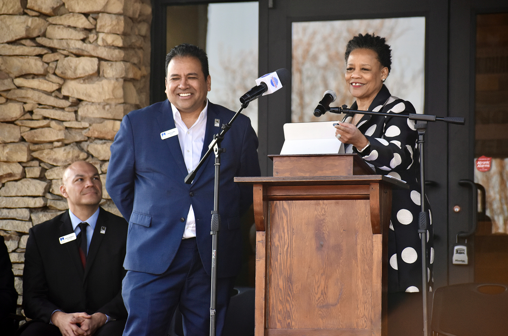 Carlos Gomez, Hispanic Chamber of Commerce, and Kim Randolph, Heartland Black Chamber of Commerce, speak during a ribbon cutting for the Minority Chamber of Commerce Development Center at 9100 Ward Parkway; photo by Nikki Overfelt Chifalu, Startland News