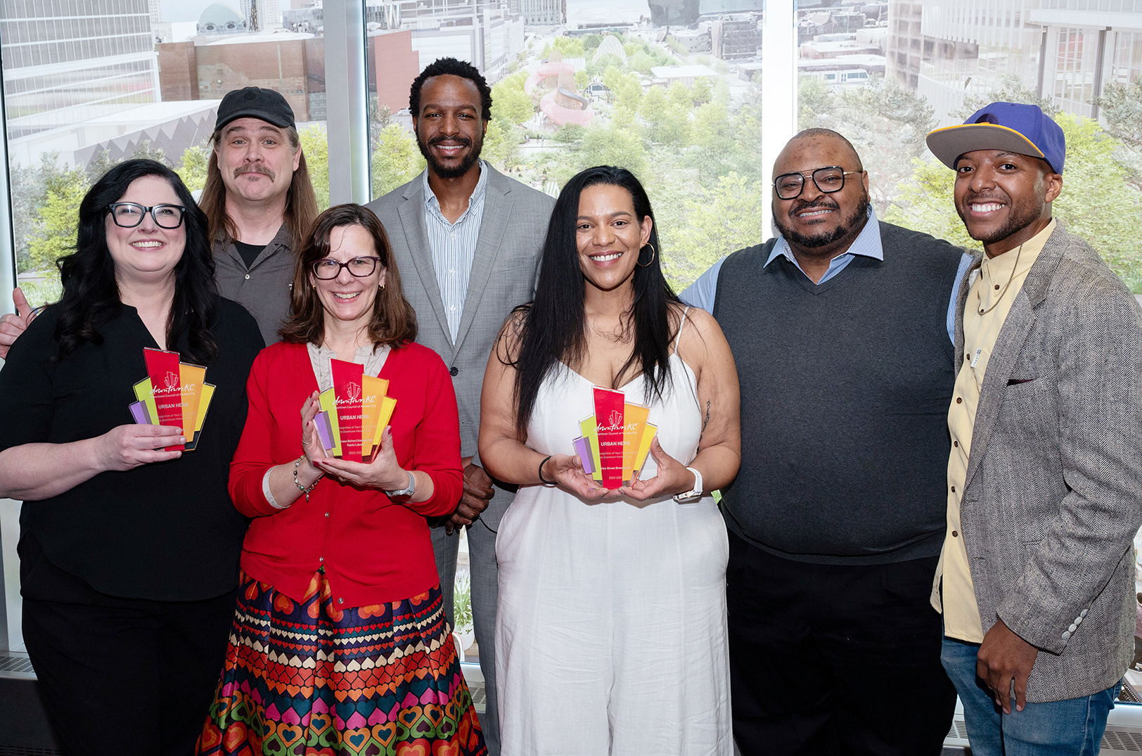 Urban Hero Award winners: Michele and Johnny Dawbarn, HITIDES Coffee; Teresa Bolton, KC Public Library; Elliott Ivory, Annie McGinnis, Woodie Bonds, Jr., and Kemet Coleman, Vine Street Brewing; Not pictured: Allan Gray, The Zhou B Arts Center; photo courtesy of Downtown Council of Kansas City