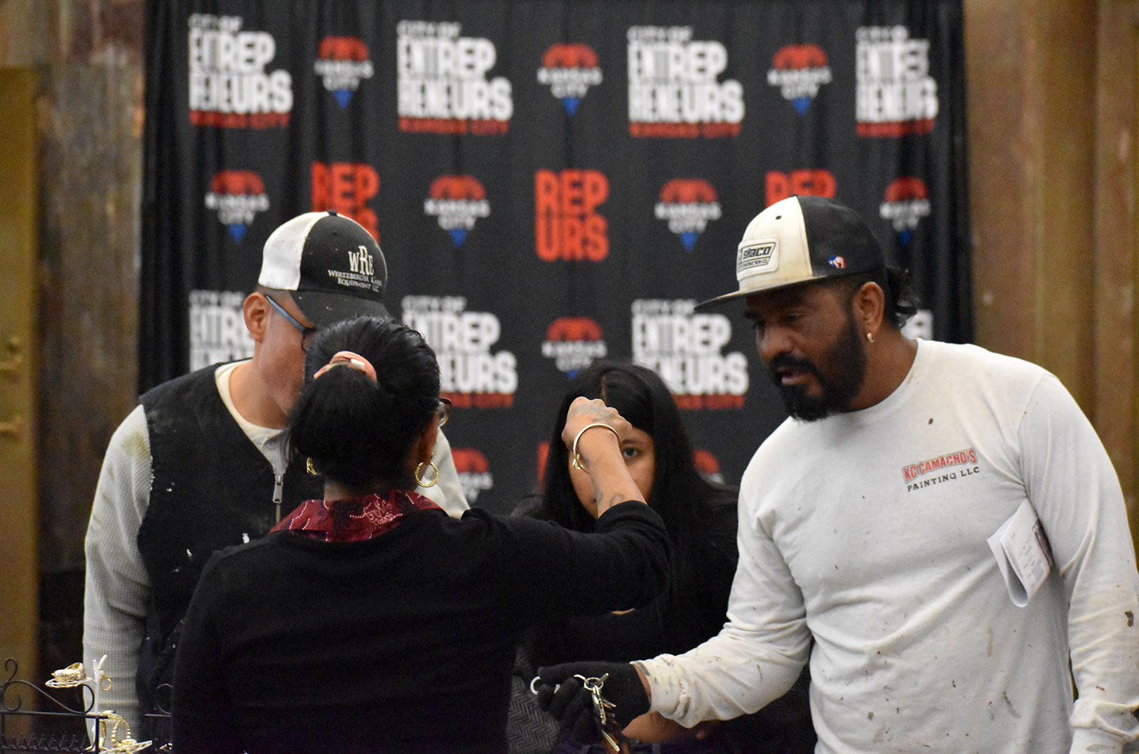 Shoppers check out jewelry from Mrs Blinkx Jewels LLC during KC BizCare's Monthly Marketplace that showcases pop-up businesses in KCMO's City Hall; photo by Tommy Felts, Startland News