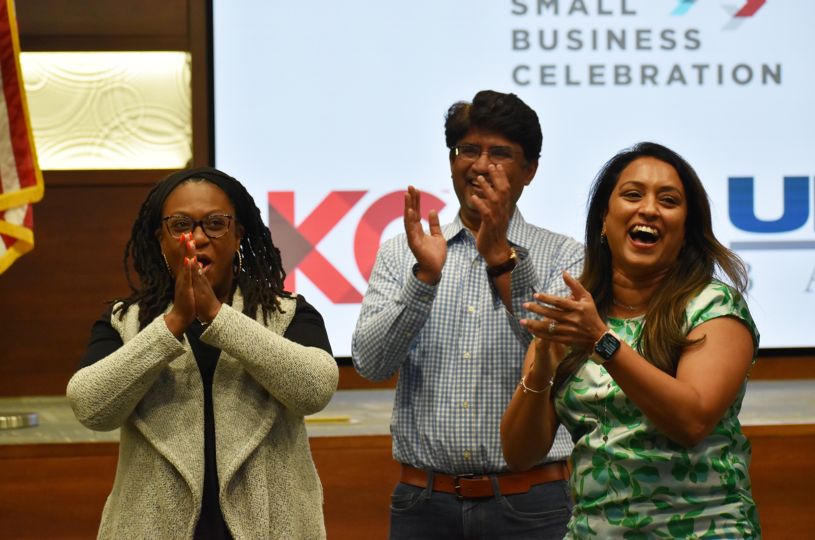 Leaders from SnapIT Solutions react to the Top 10 announcement at UMB Bank during a KC Chamber Small Business Celebration reveal event; photo by Tommy Felts, Startland News