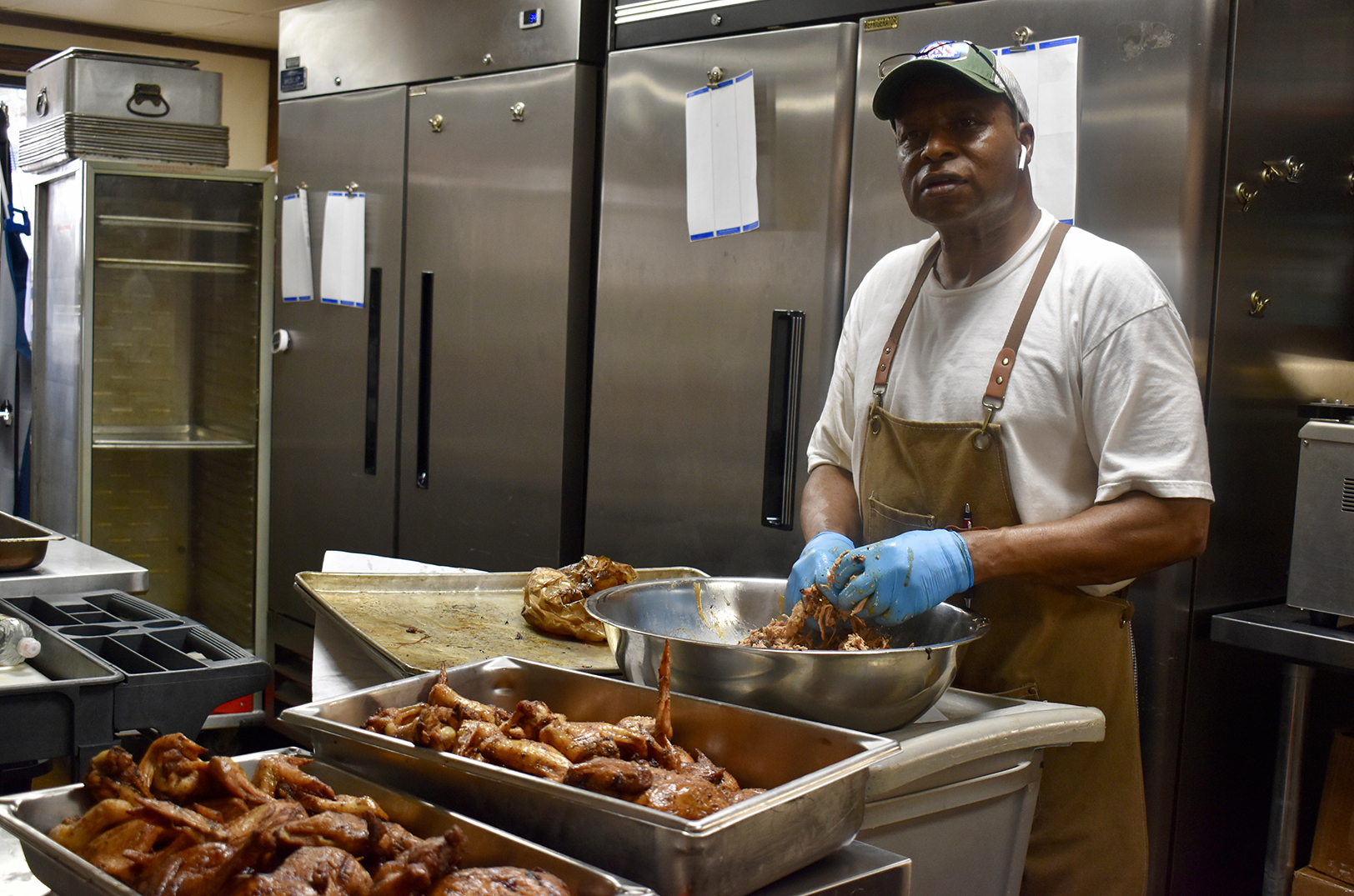 Gerald Dunn, Dunn Deal BBQ, preps barbecue before the lunch rush at his restaurant in Grandview; photo by Nikki Overfelt Chifalu, Startland News