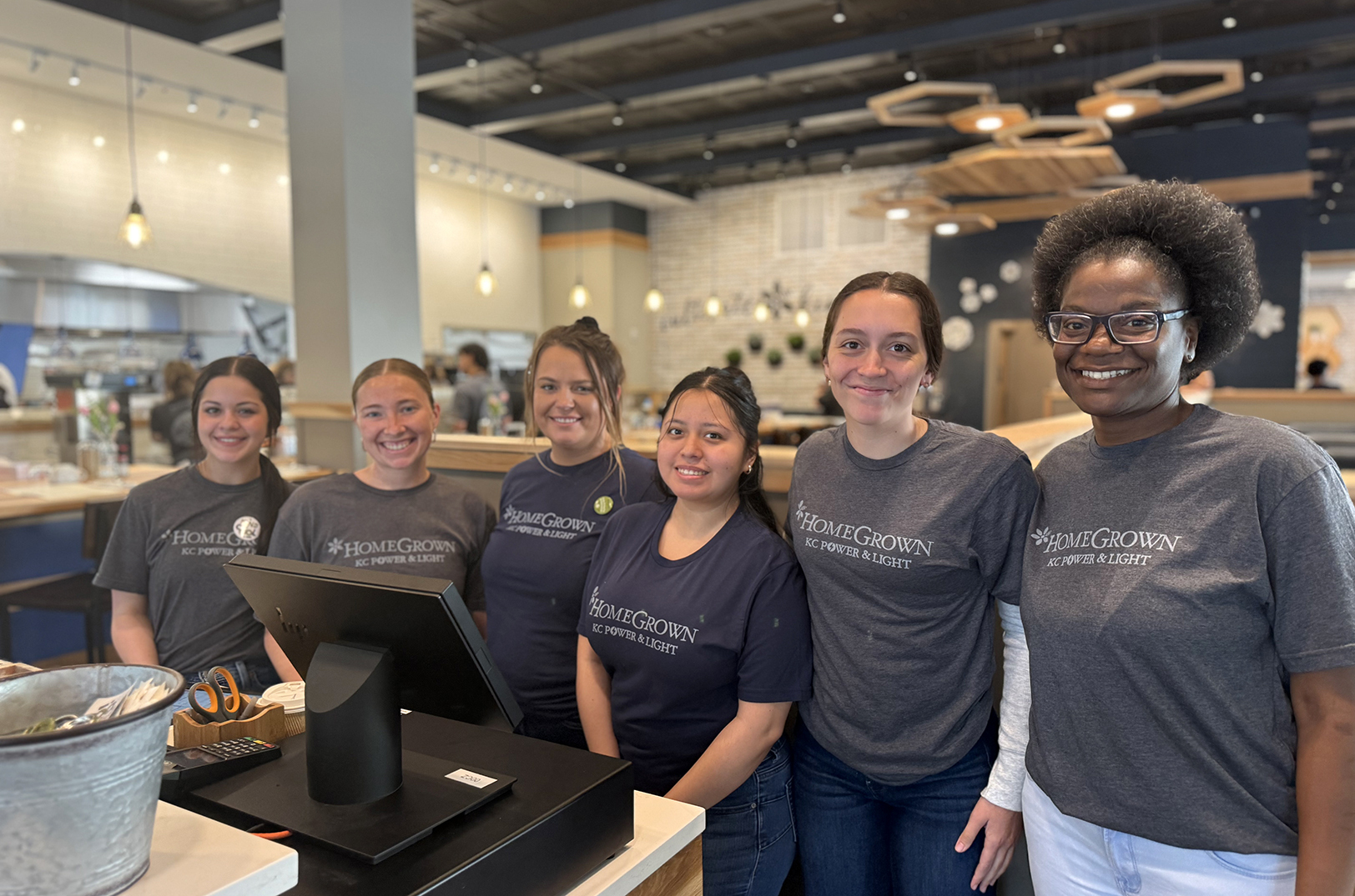 The team at HomeGrown's downtown location within the Kansas City Power & Light District; photo courtesy of Power & Light