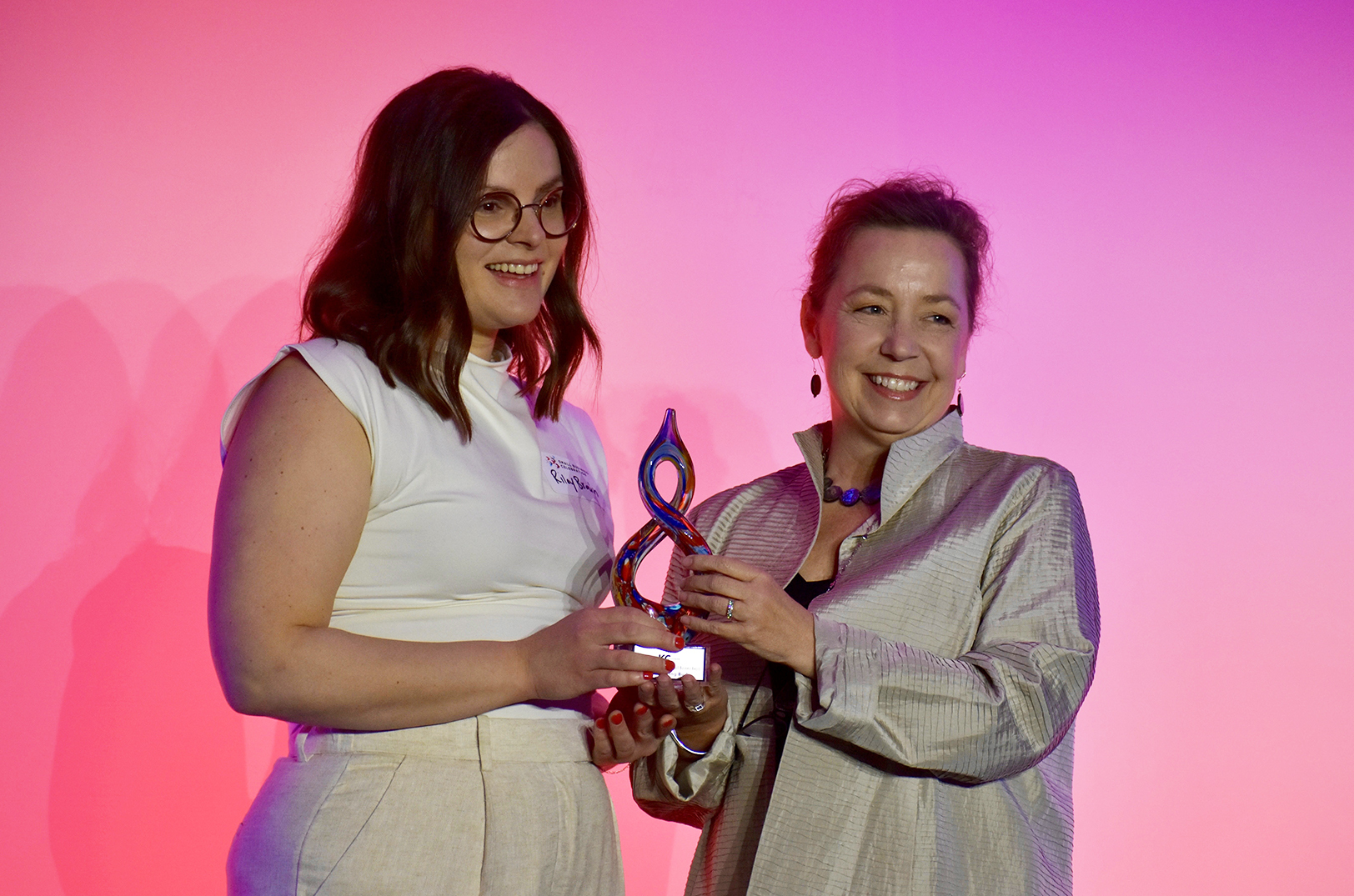 Riley Brain, Wandering Bud, left, accepts the KC Chamber's first-ever Luminary Art and Creative Small Business Award; photo by Nikki Overfelt Chifalu, Startland News