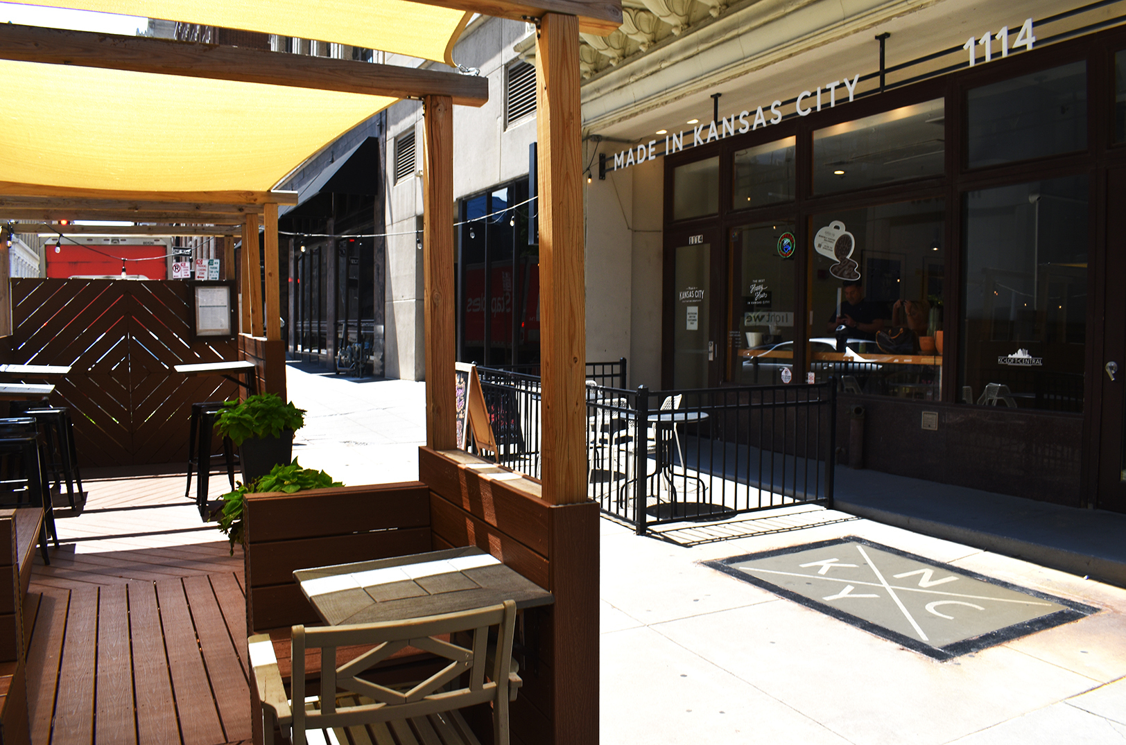 Outdoor dining space in front of Made in KC Cafe in downtown Kansas City; the business was among the first two transition outdoor street space to dining during the pandemic; photo by Taylor Wilmore, Startland News