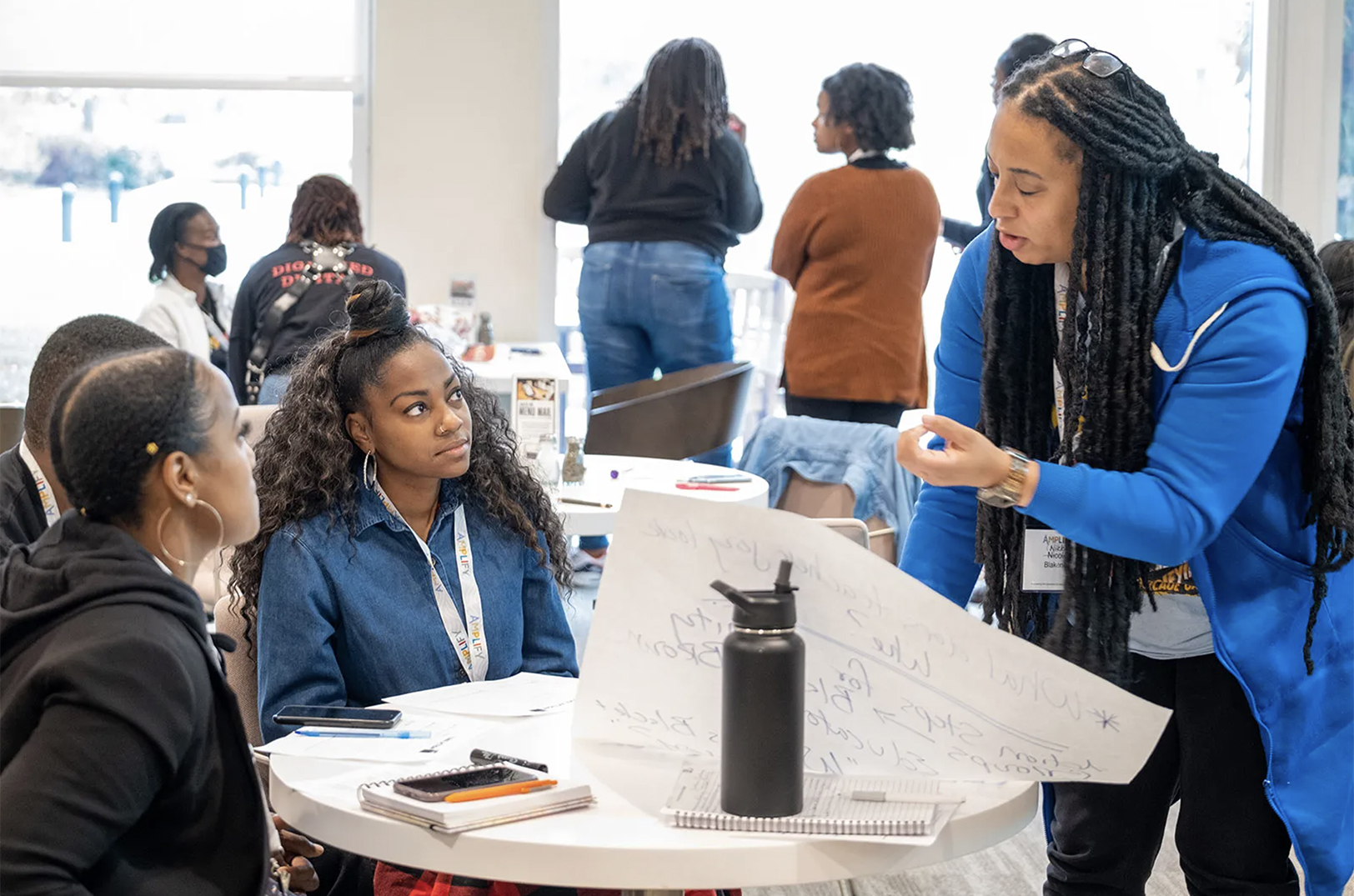 Participants engage during a session of the Amplify: Empowering Educators of Color for Student Success program, backed by the Ewing Marion Kauffman Foundation; photo courtesy of the Kauffman Foundation