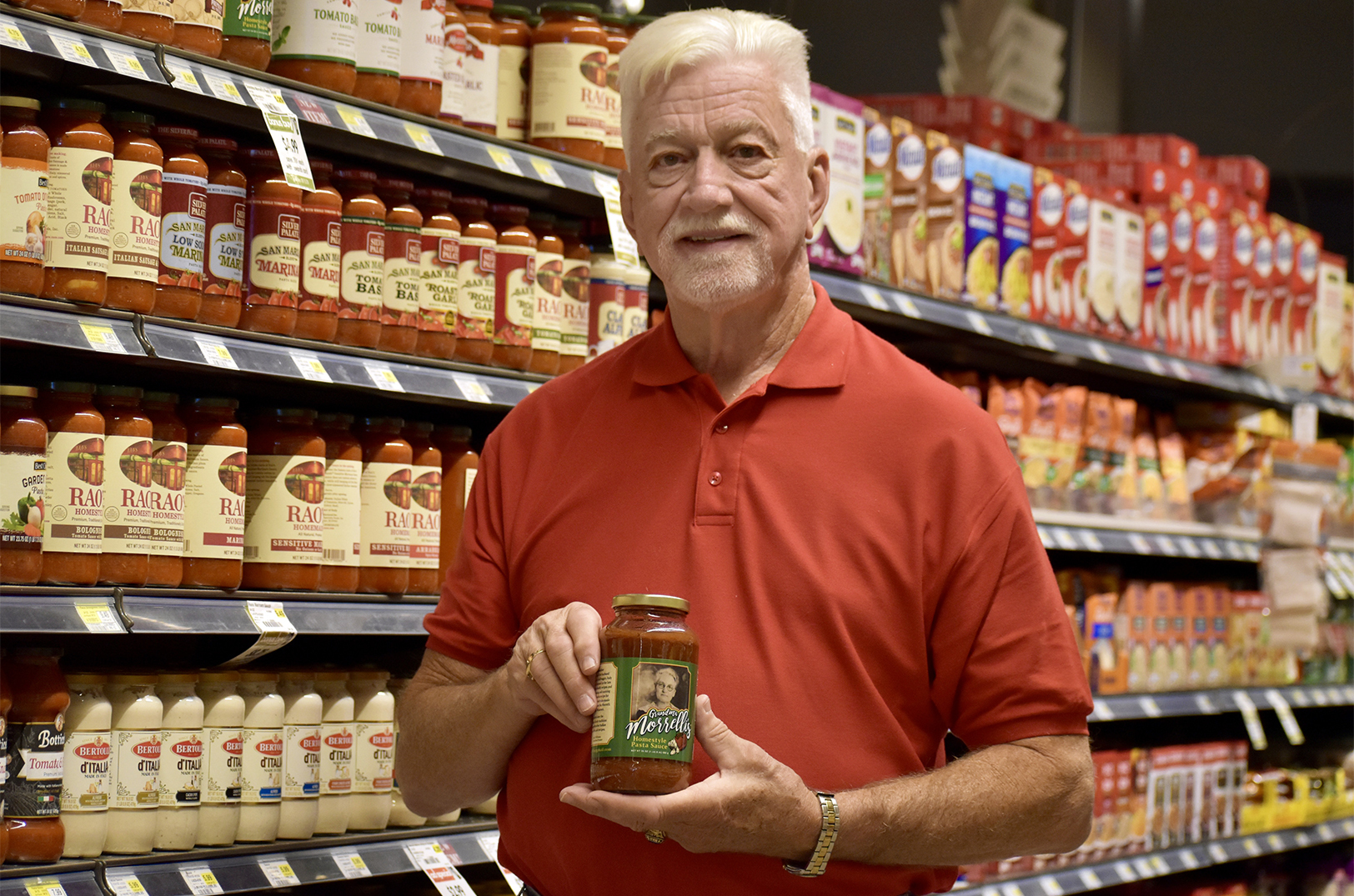 Jack Williams with Grandma Morrelli’s pasta sauce at Hen's House in Leawood, Kansas; photo by Nikki Overfelt Chifalu, Startland News