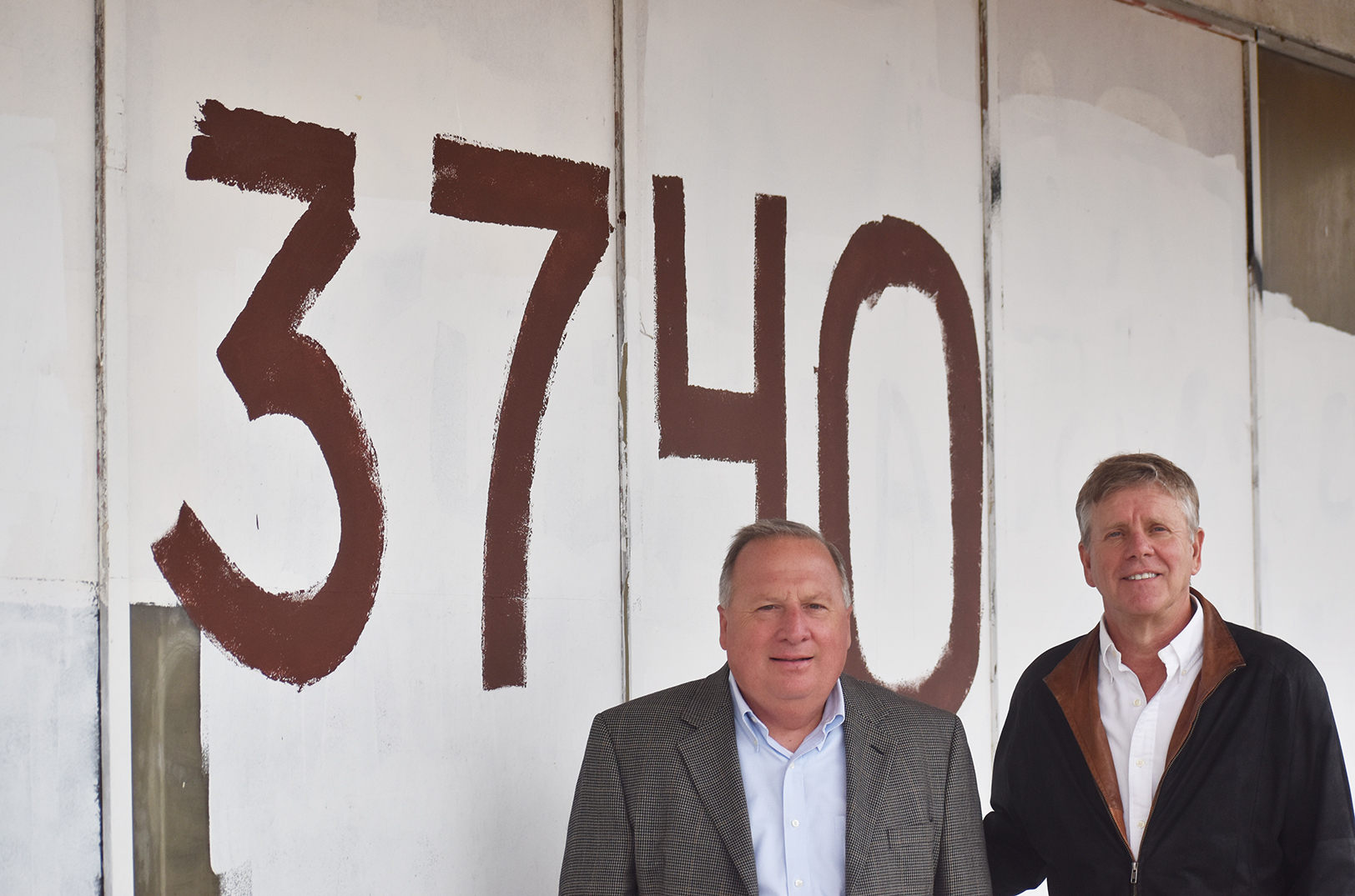Byron Pendleton and Butch Rigby, Screenland Real Estate Services, outside the former Safeway building at 3740 Troost Ave.; photo by Taylor Wilmore, Startland News