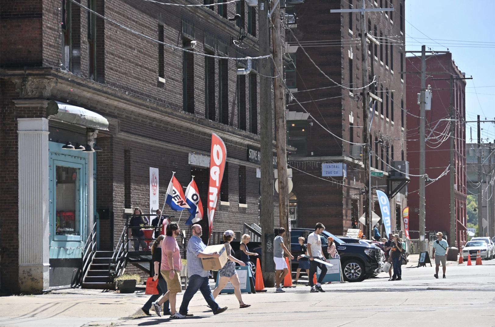 Visitors to the West Bottoms walk along Hickory Street near 12th during the First Weekend celebration on Sept. 8, 2024; photo by Carlos Moreno, KCUR